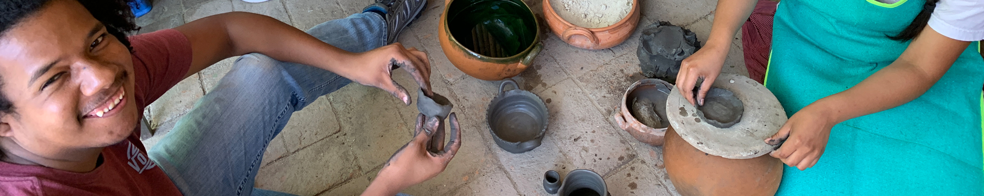 students in Oaxaca making pottery